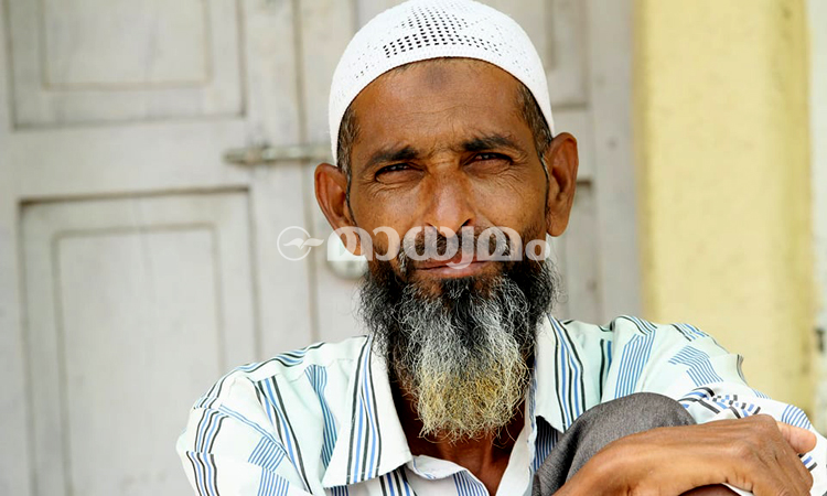 A man in front of guldabad dargha